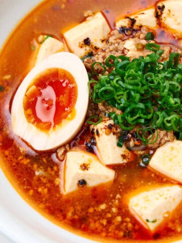 Spicy Mapo Tofu Noodle Soup with a ramen egg.